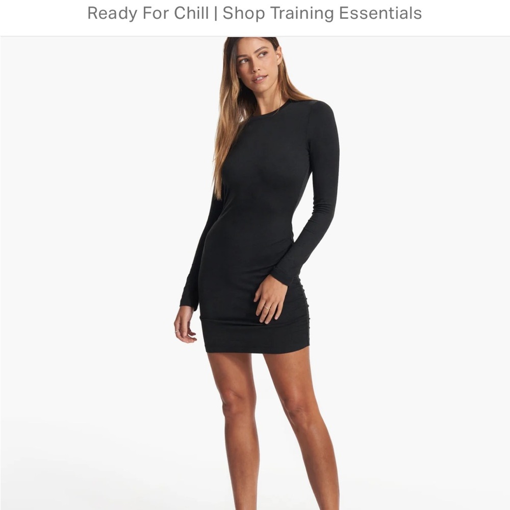 Vuori black heather knit dress. NWT size small.